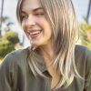 Emy by Amore synthetic wig on woman looking away