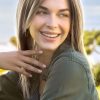 Emy by Amore synthetic wig looking over should