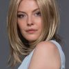 Woman with short blonde synthetic wig