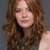 Woman with red synthetic wig